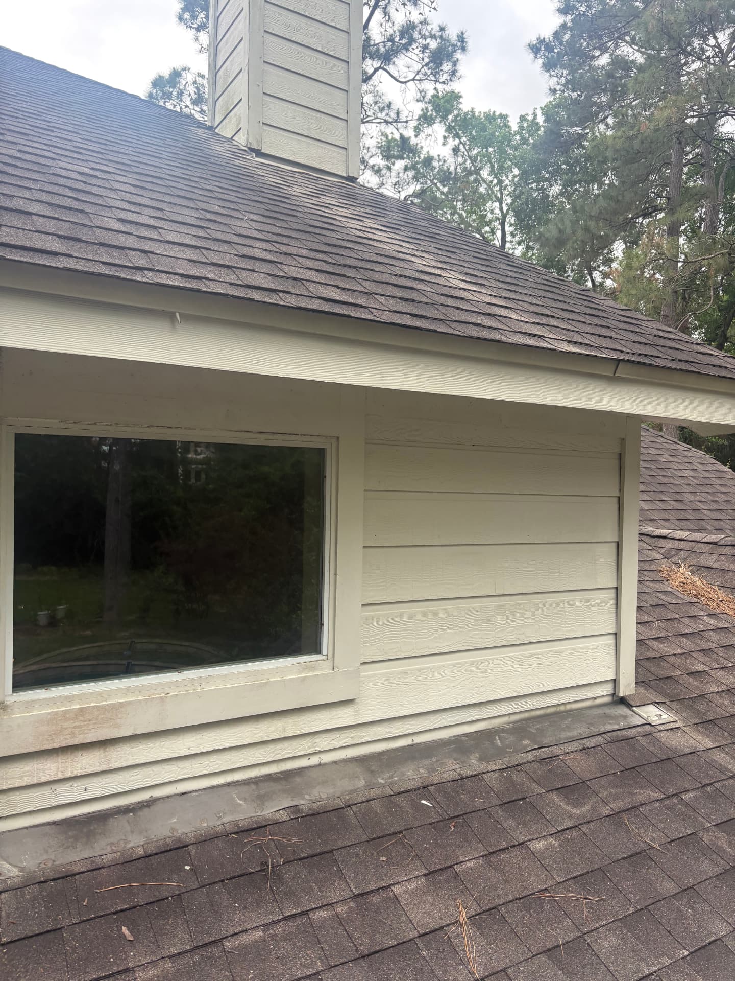 Dormer with clean siding after a wash — pressure washing in Montgomery, TX